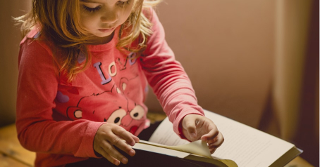 Child reading the bible